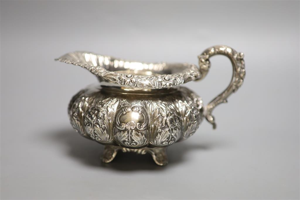 A George IV Irish silver squat melon shaped cream jug, James Le Bas, Dublin, 1828, height 11.2cm, 12oz.